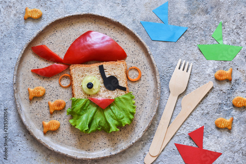 Funny food for children - pirate sandwich. Lunch for children.