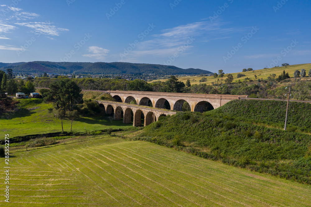 An old train viaduct bridge in the countryside