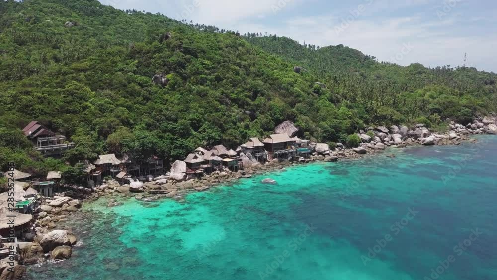 Tropical Island Koh Tao with Turquoise Water Bay and Residental Area on Shore in Thailand. Aerial Top View Tropical Island Koh Tao with Turquoise Water Bay and Residental Area on Shore in Thailand. Aerial Top View