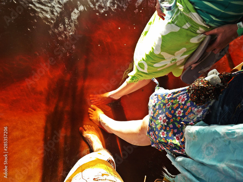 Feets in the wfeet dipped in river water