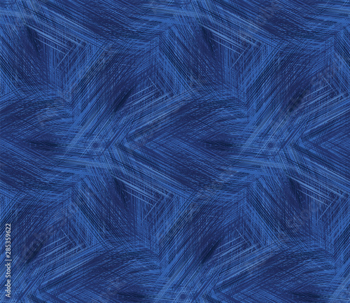 Indigo blue woven brush stroke denim texture. Seamless pattern background. Japanese style batik textile. Variegated for summer fashion swatch.