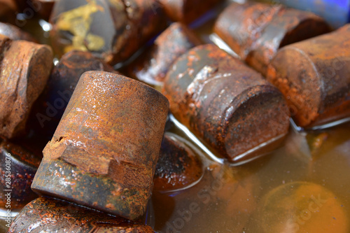 Steel immersed in water causes rust. Rust caused by the reaction between Oxygen and iron It is a type of corrosion that is a type of Corrosion which often occurs with metals such as iron.