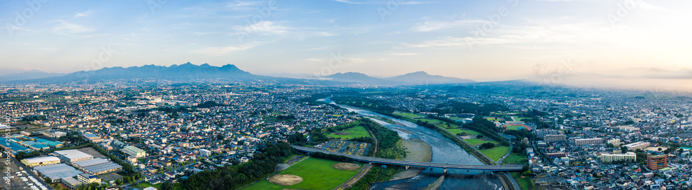 Aerial drone photo - Sunrise over the city of Maebashi, Gunma Prefecture.  Japan, Asia