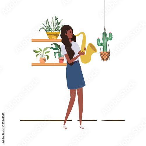 woman with saxophone and houseplants on macrame hangers of background