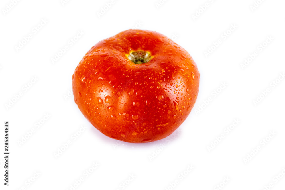 Raw, red, organic tomato isolated on white background. Healthy eating concept. Raw, red, organic tomato isolated on white background. Healthy eating concept.