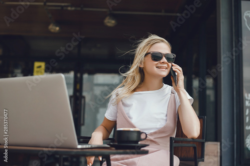 Pretty Young Beauty Woman Using Laptop in cafe, outdoor portrait business woman, hipster style, internet, smartphone, office, Bali Indonesia, holding, mac OS, manager, freelancer 