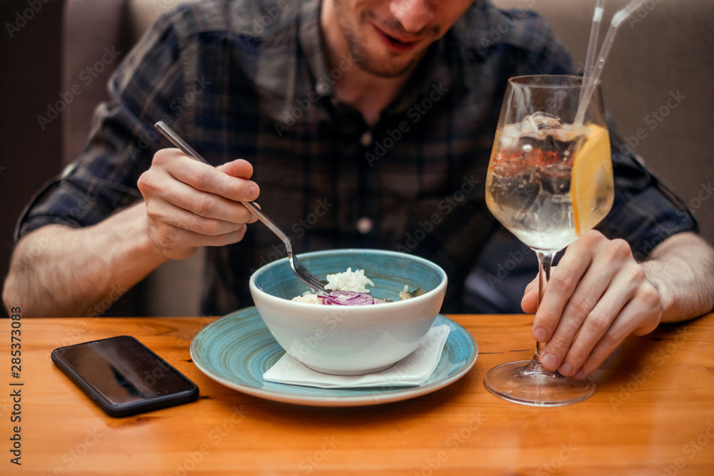 Young beard man posing in cafe, eating salad, healthy food, Young beard man posing in cafe, eating salad, healthy food,
