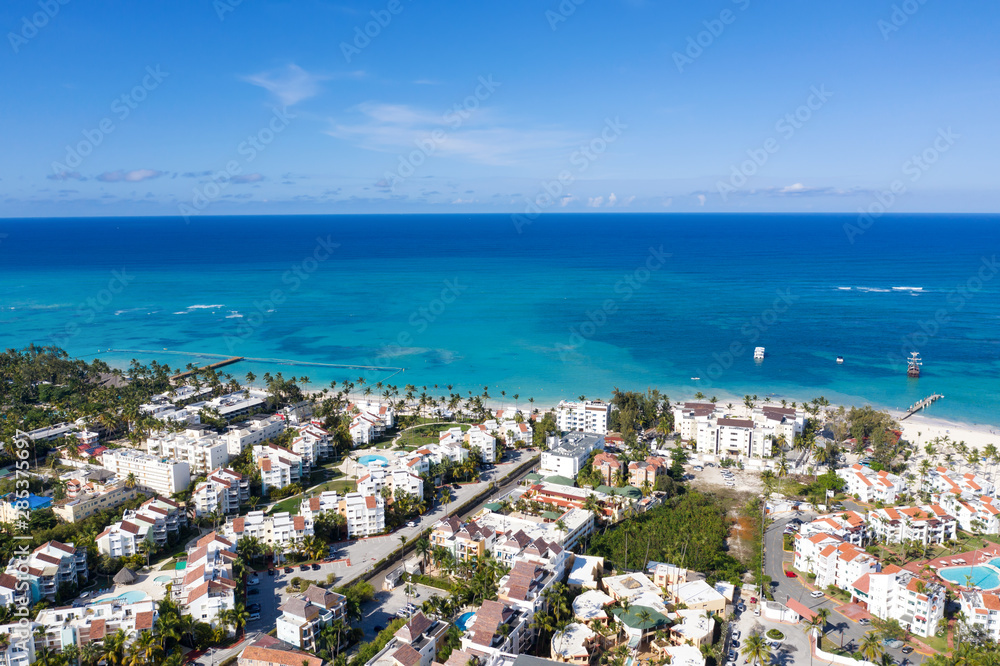 Aerial view with caribbean city on the beach