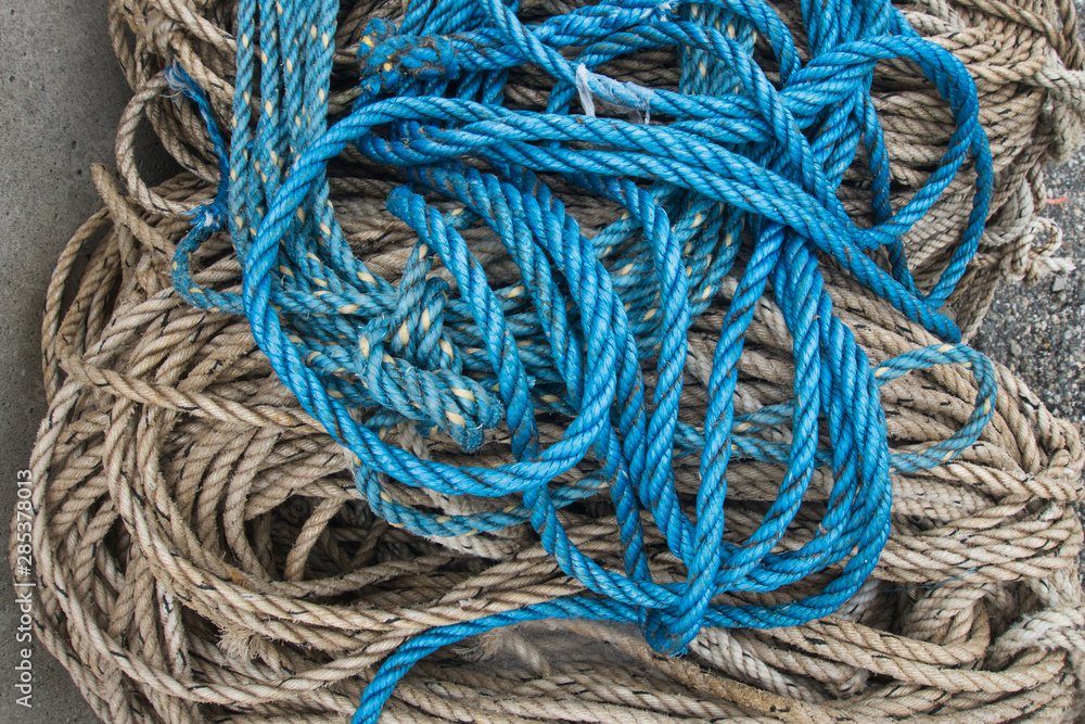 Outside nature photo featuring blue rope texture from a lobster boat