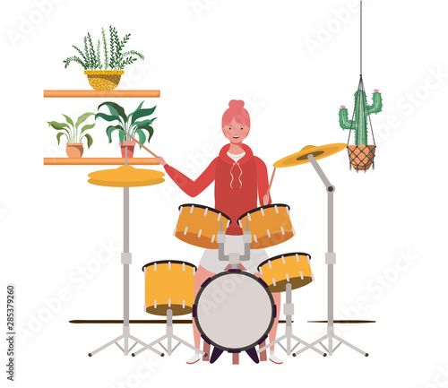 woman with drum kit and houseplants on macrame hangers of background