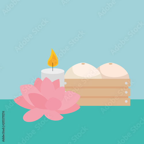 paraffin candle with lotus flower and wooden box
