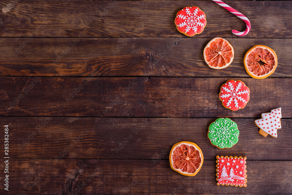 Christmas homemade gingerbread cookies on wooden table. It can be used as a background Christmas homemade gingerbread cookies on wooden table. It can be used as a background
