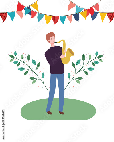 man with saxophone and branches and leaves in the background