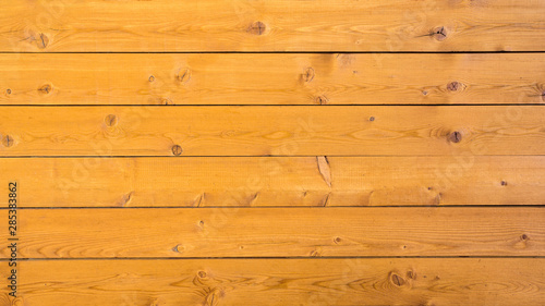 Wooden boards covered with protective paint texture background. The picture aspect ratio is 16: 9. 