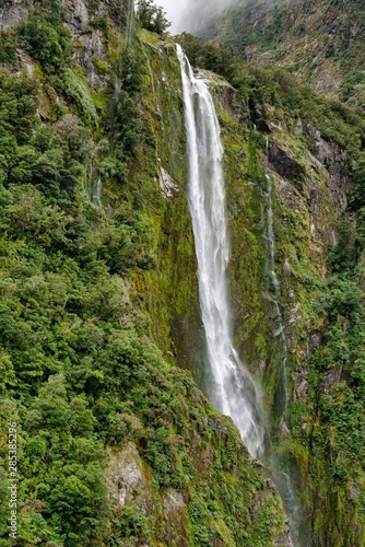 long waterfall in the cliffs of Milford Sound