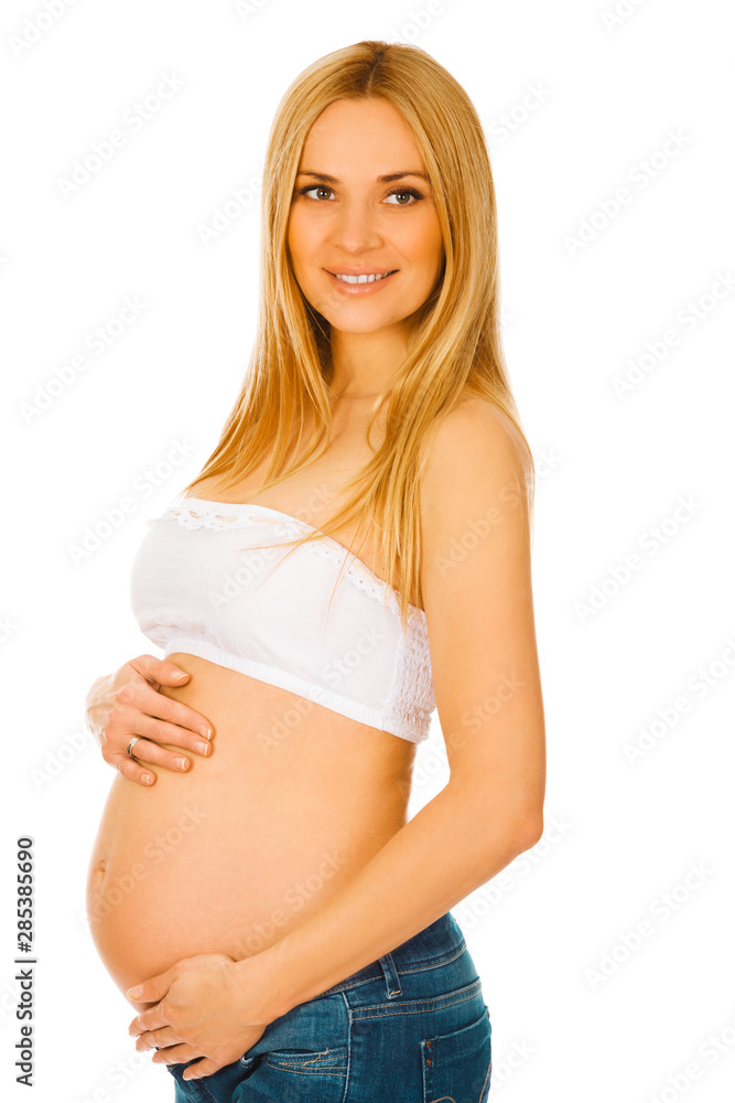 Young pregnant woman holding her hands on her belly. Maternity concept. Young pregnant woman holding her hands on her belly. Maternity concept.