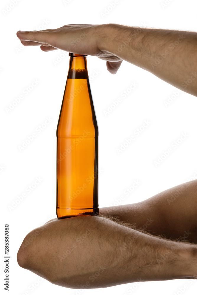 male hand holding brown beer bottle without label isolated on white background male hand holding brown beer bottle without label isolated on white background
