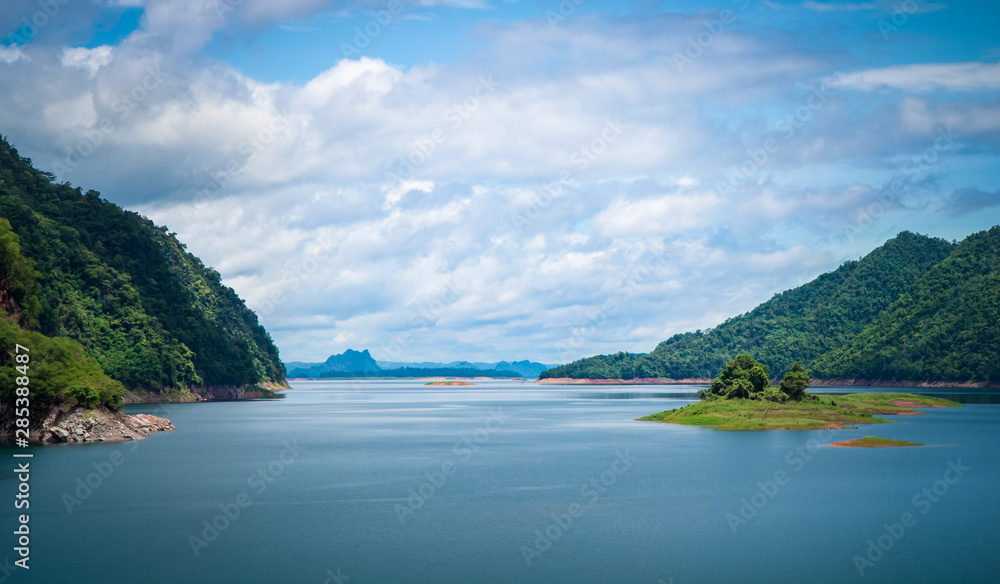 Landscape of green mountain and Water in the dam between the hills with  Lake at The Vajiralongkorn Dam(Khao Laem Dam) ,kanchanaburi, thailand