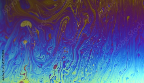 Vivid Rainbow Colour Swirls Soap Bubble Extreme Close up. Psychedelic abstract background
