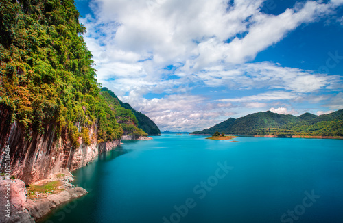 Landscape of green mountain and Water in the dam between the hills with  Lake at The Vajiralongkorn Dam Khao Laem Dam   kanchanaburi  thailand