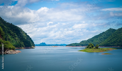 Fototapeta Naklejka Na Ścianę i Meble -  Landscape of green mountain and Water in the dam between the hills with  Lake at The Vajiralongkorn Dam(Khao Laem Dam) ,kanchanaburi, thailand