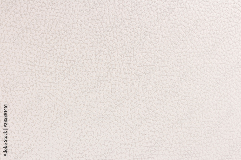 Beautiful white leather textured backdrop for your design. Seamless beige colored fabric texture. Ivory color paper background. 