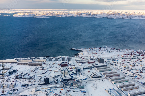 Aerial view to the fjord and snow streets of Greenlandic capital Nuuk city, Greenland