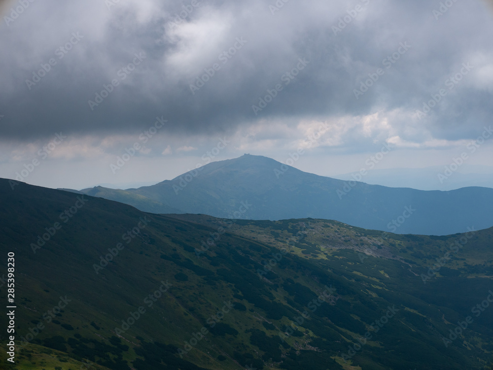 Mountain valley during sunrise / sunset. Natural summer landscape. Colorful summer landscape in the Carpathian mountains.