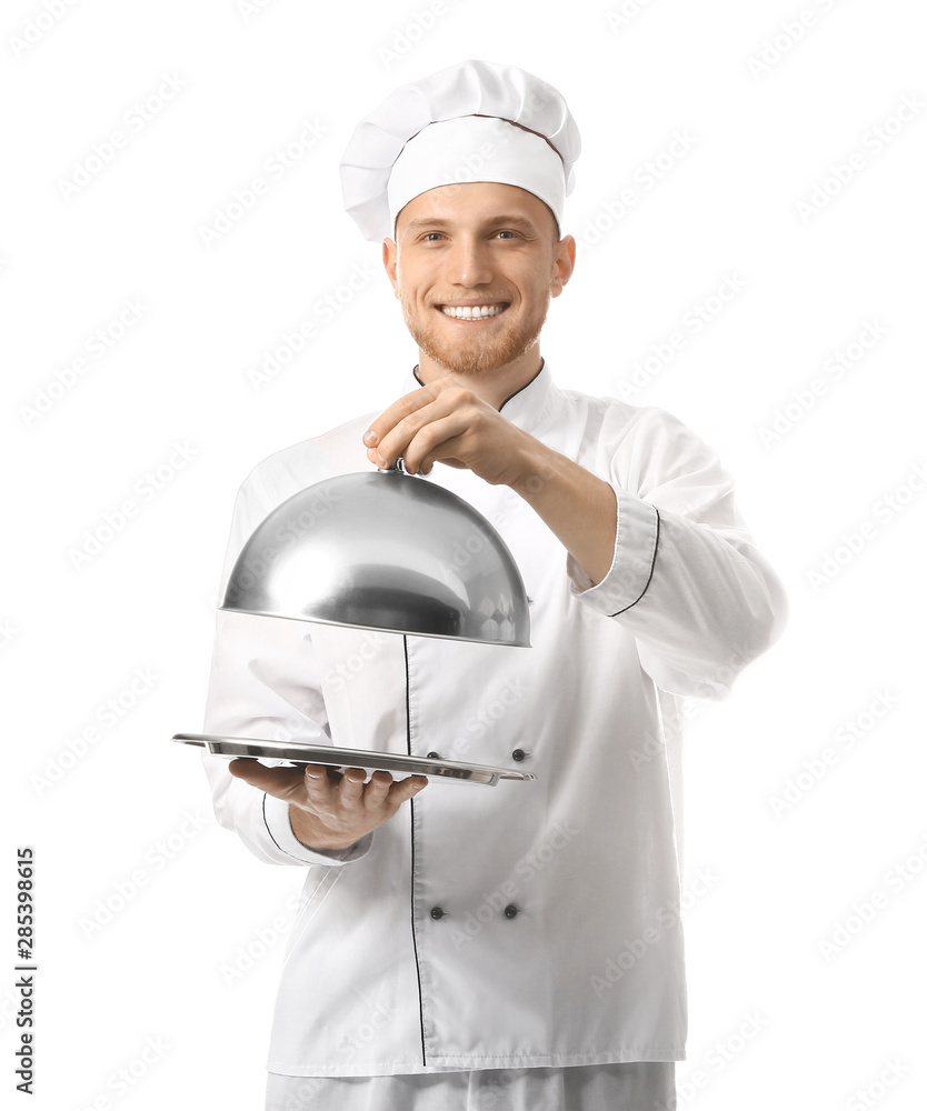 Handsome male chef with tray and cloche on white background Handsome male chef with tray and cloche on white background