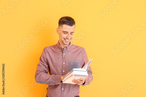Handsome male teacher with ...