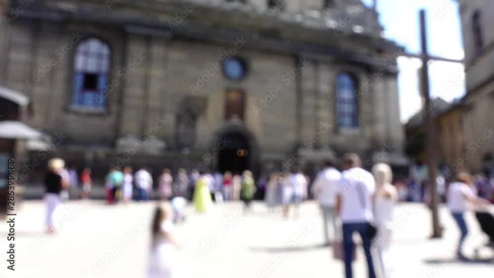 The people near the Catholic Cathedral. Time lapse shoot. Lviv, Ukraine. Out of focus. The people near the Catholic Cathedral. Time lapse shoot. Lviv, Ukraine. Out of focus.