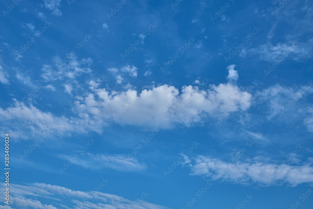 Clouds on the blue sky.