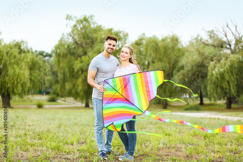 Happy young couple with kit...
