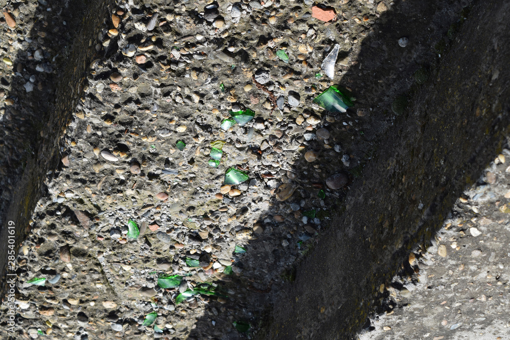Obraz premium Glass splinters on concrete steps