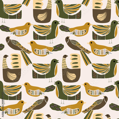 Folk art beautiful birds in a seamless pattern design