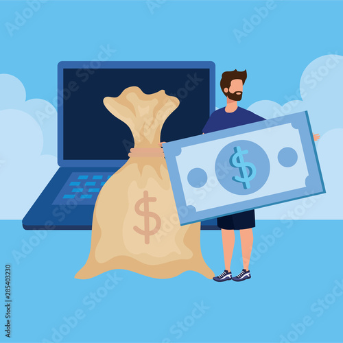 young man with laptop and money