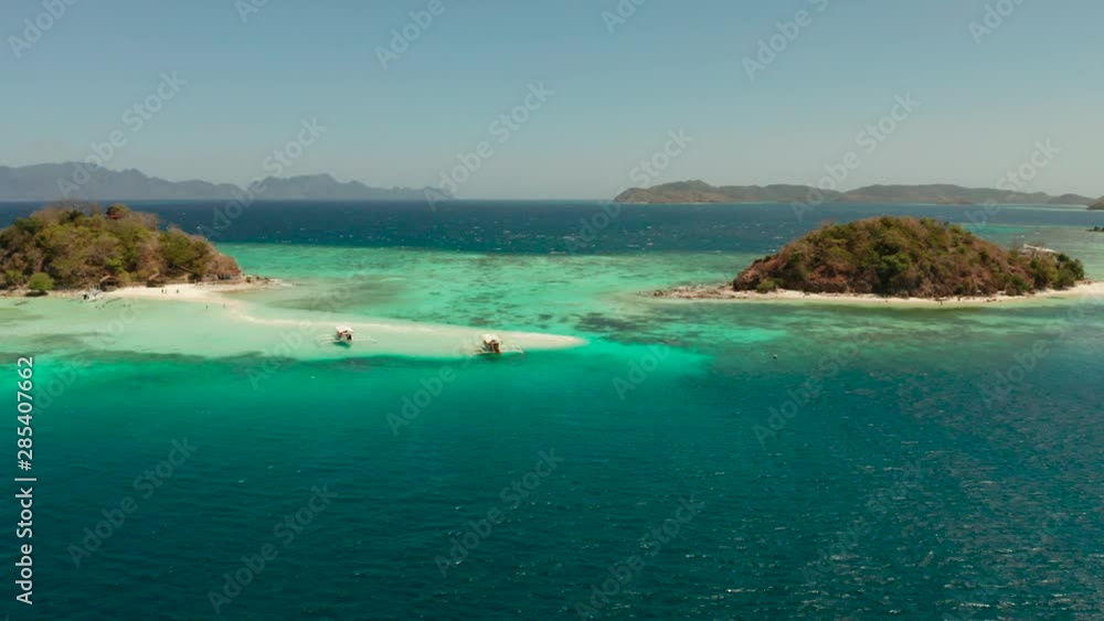 aerial seascape tropical beach with white sand and clear blue sea. tropical landscape with islands and beaches. Philippines, Palawan. aerial seascape tropical beach with white sand and clear blue sea. tropical landscape with islands and beaches. Philippines, Palawan.