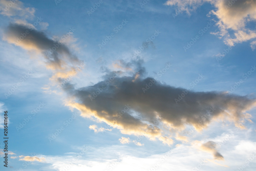 Sunset And a gray cloud with a blue sky