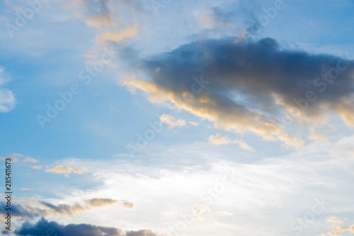 Sunset And a gray cloud with a blue sky