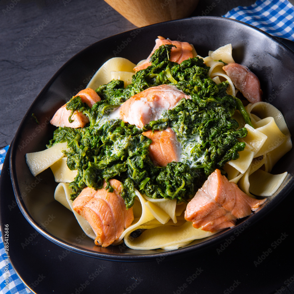 pappardelle pasta with creamed spinach and fried salmon pappardelle pasta with creamed spinach and fried salmon