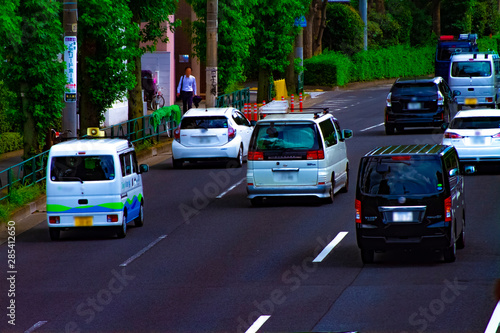 A downtown street at Kanpachi avenue in Tokyo daytime photo