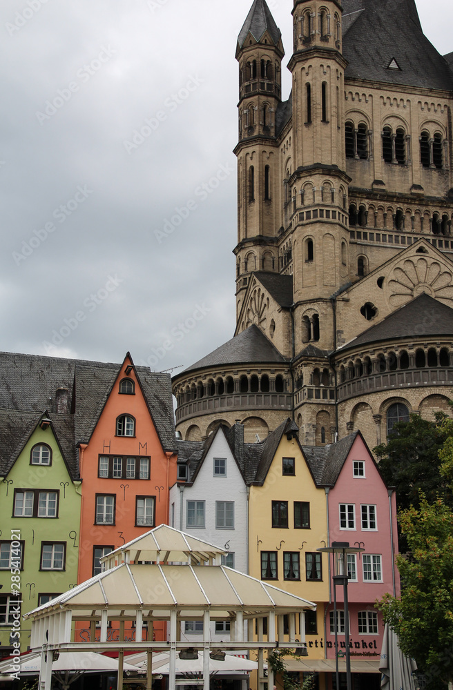 Great Saint Martin Church of Cologne and colored houses