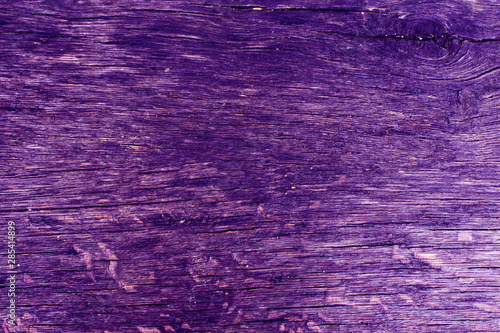 Violet wooden texture background. Copy space.