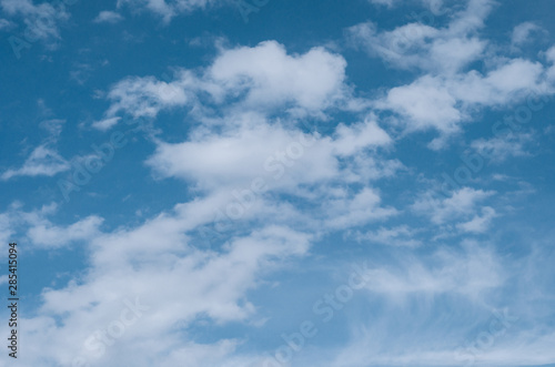 beautiful clouds on a background of clear blue sky