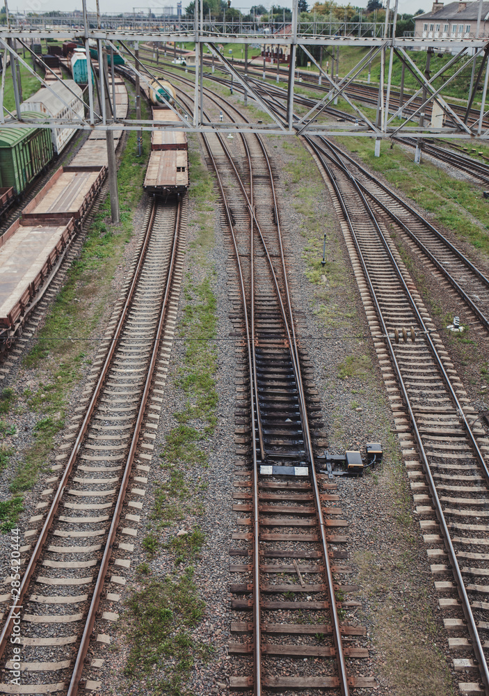 View of the rails with freight trains.  Railway