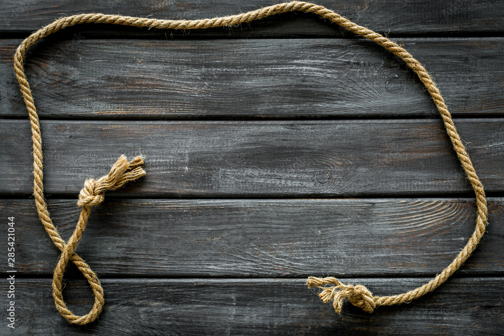 rope frame on wooden background top view mock up
