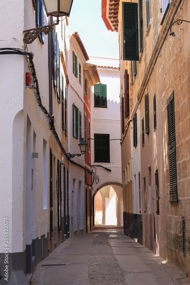 Stone street of Ciutadella town in the evening, Ciutadella, Balearic islands, Spain