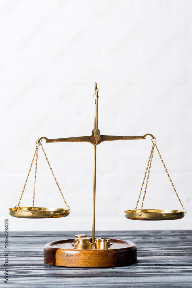 Scales of Justice on the table Scales of Justice on the table