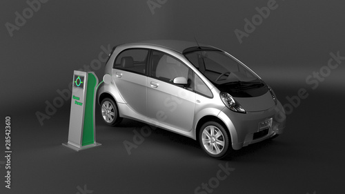 Automobile elettrica ecologica o ibrida in carica photo