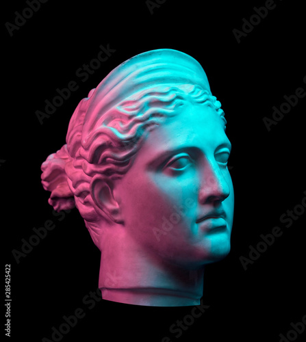 Photo Gypsum copy of ancient statue Diana head isolated on black background